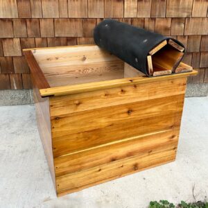 Outdoor cedar cold plunge tub with roll top